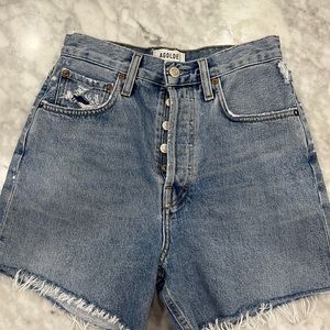 Agolde distressed jean shorts.
